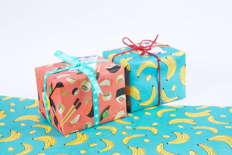Two presents wrapped in colorful wrapping paper