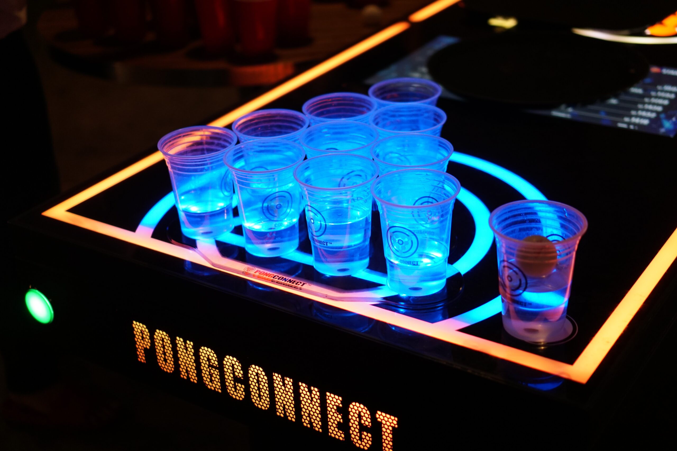 Pong Connect party game with clear cups and neon lights