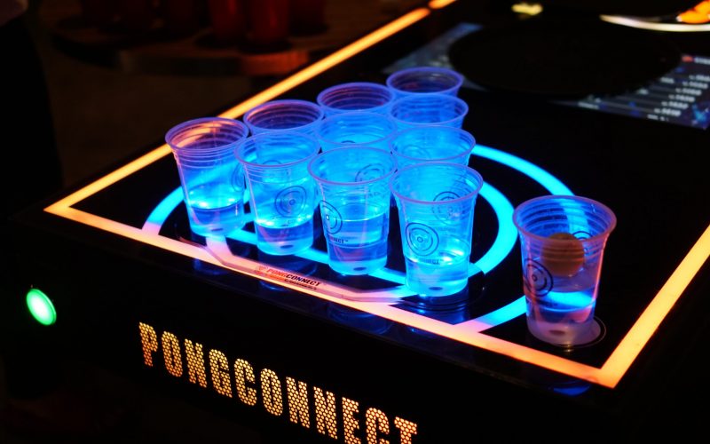 Pong Connect party game with clear cups and neon lights